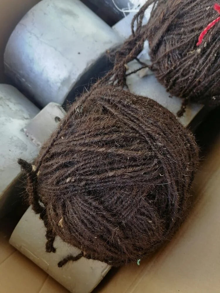 Handspun camel and goat wool reveals the natural fibers that form the foundation of a Bedouin tent — each thread woven for a durable, breathable shelter.